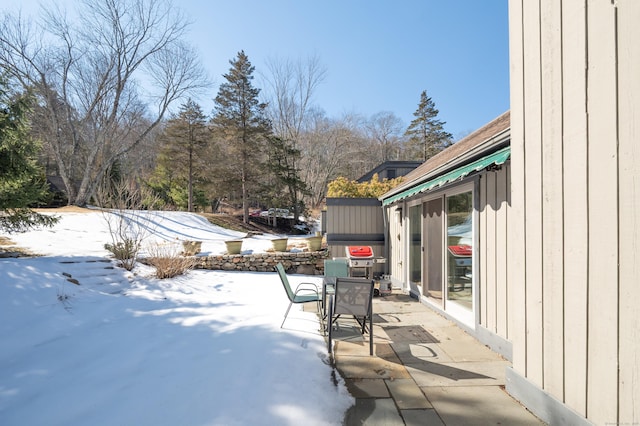 view of snow covered patio