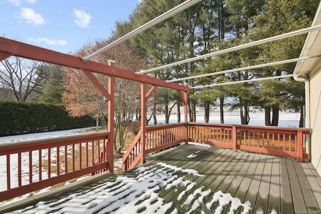 view of snow covered deck