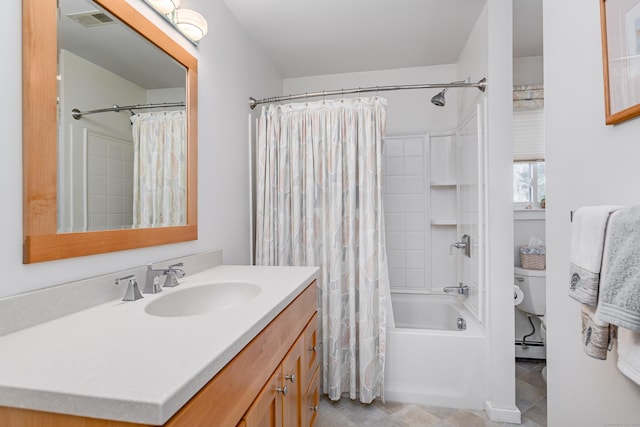 full bathroom featuring shower / tub combo, visible vents, baseboard heating, and vanity