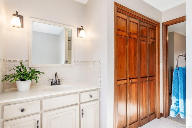 bathroom with backsplash and vanity