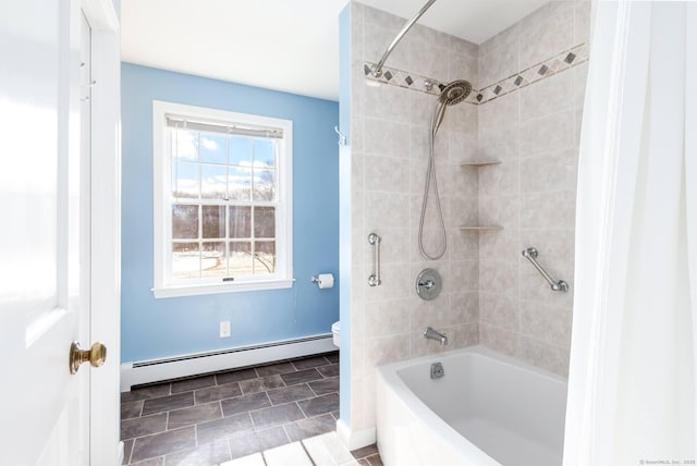 bathroom with a baseboard radiator, bathtub / shower combination, toilet, and baseboards