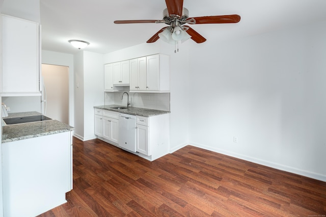 kitchen featuring light stone counters, white dishwasher, and white cabinetry