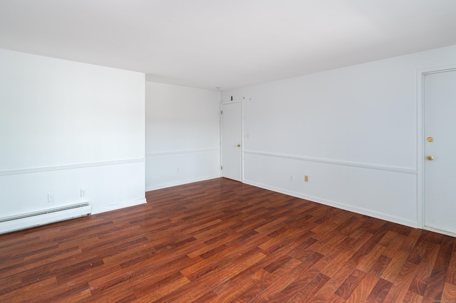 unfurnished room with dark wood-style floors and baseboards