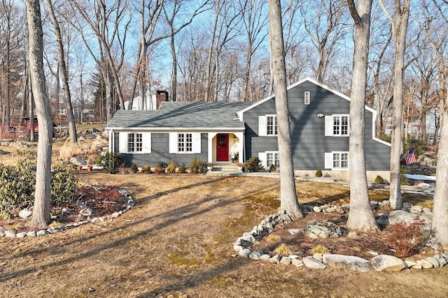 tri-level home with a chimney