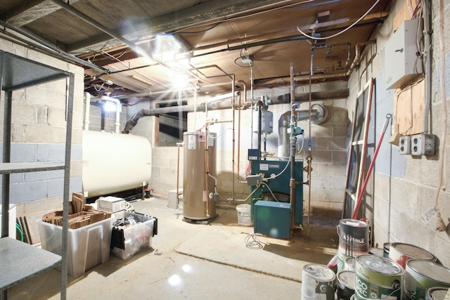 unfinished below grade area with heating fuel, water heater, and a heating unit