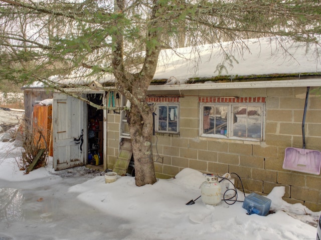 exterior space with concrete block siding