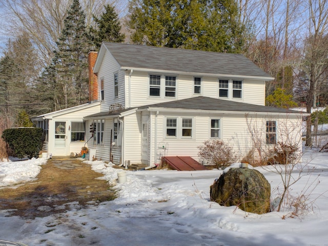 exterior space featuring a chimney