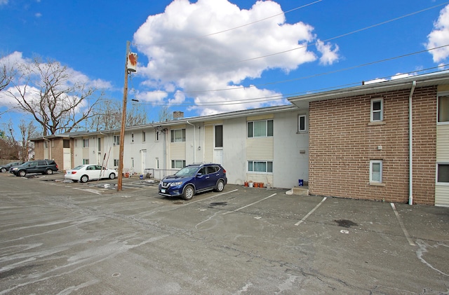 exterior space featuring uncovered parking