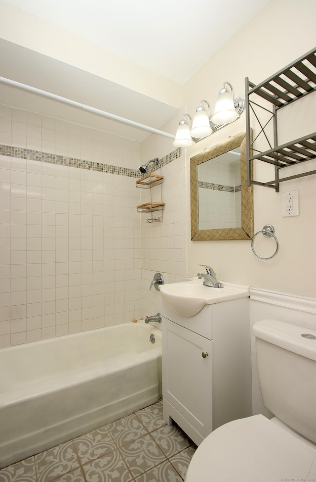 full bathroom with toilet, bathing tub / shower combination, tile patterned flooring, and vanity