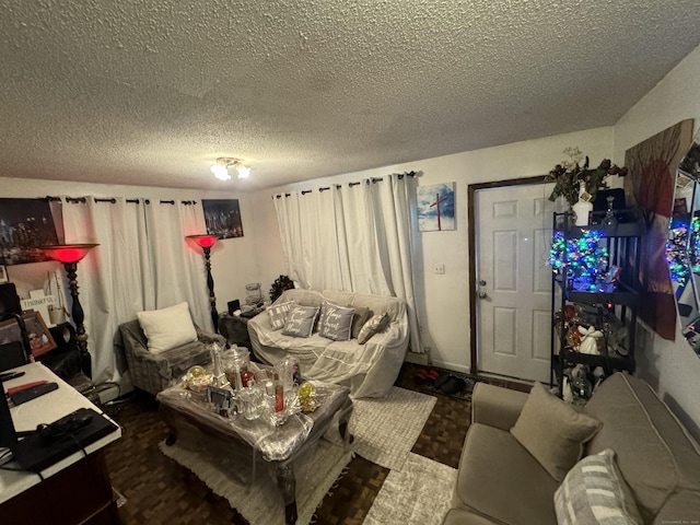 living room with a textured ceiling