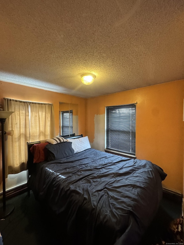 bedroom with a textured ceiling