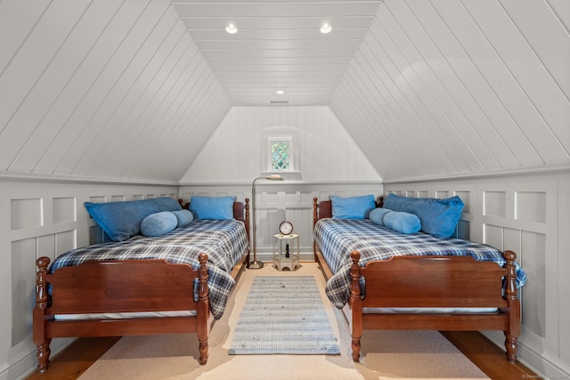 bedroom featuring lofted ceiling