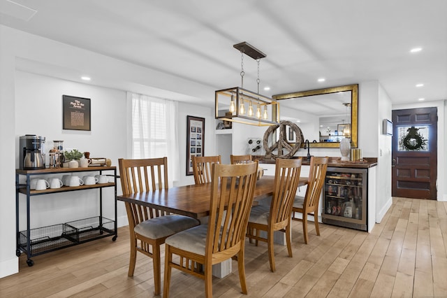 11 Pearl St, Groton, CT 06340 - dining area with beverage cooler, recessed lighting, bar, and light wood-type flooring