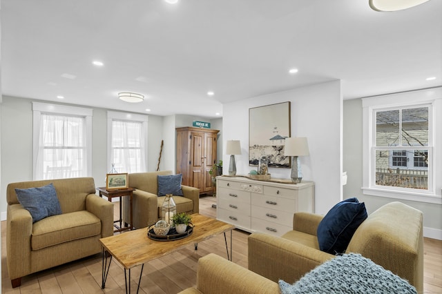11 Pearl St, Groton, CT 06340 - living room with light wood finished floors, recessed lighting, and a wealth of natural light