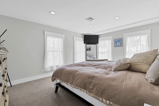 11 Pearl St, Groton, CT 06340 - carpeted bedroom featuring visible vents, multiple windows, and baseboards