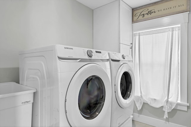 11 Pearl St, Groton, CT 06340 - clothes washing area featuring cabinet space, independent washer and dryer, and a sink