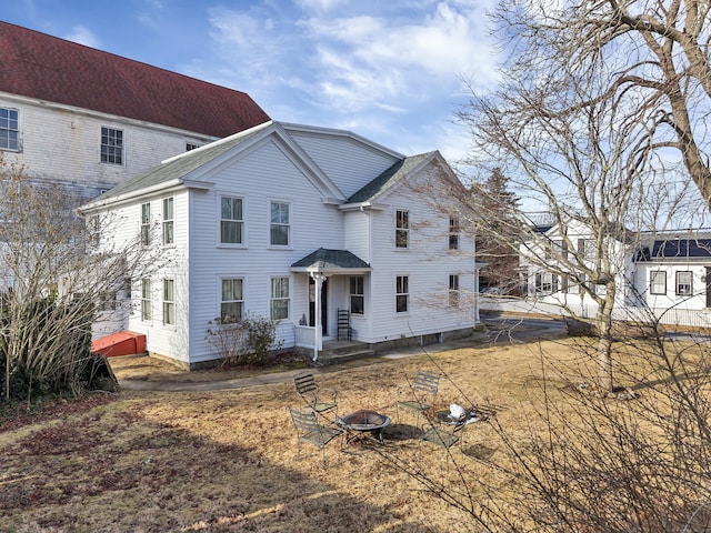 11 Pearl St, Groton, CT 06340 - view of front facade with a fire pit and roof with shingles