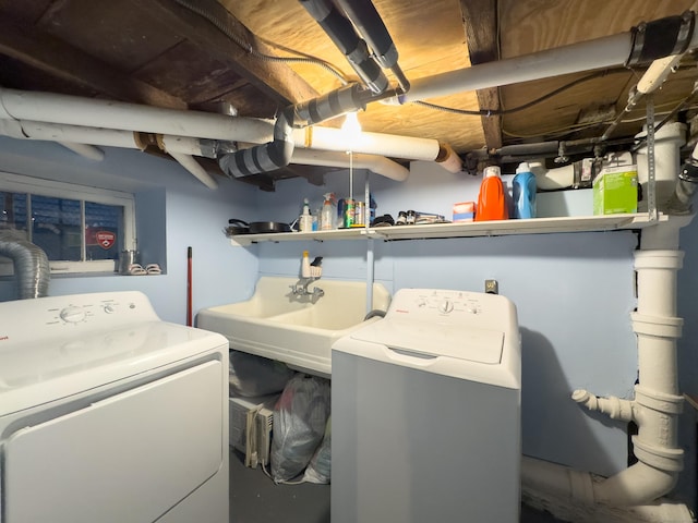 laundry room featuring laundry area and separate washer and dryer