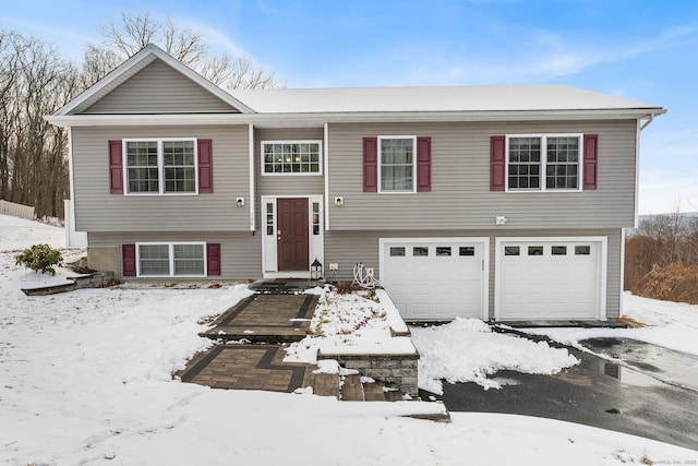 bi-level home with an attached garage