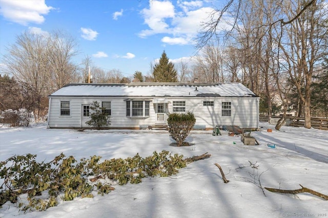 view of snow covered property