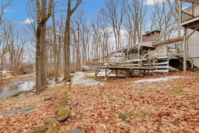 view of yard with a deck