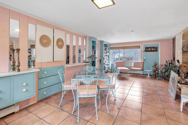 dining area featuring light tile patterned floors