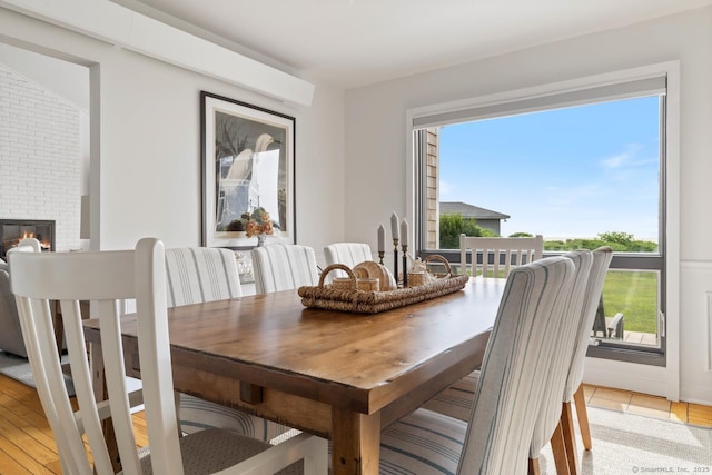 dining room featuring a fireplace