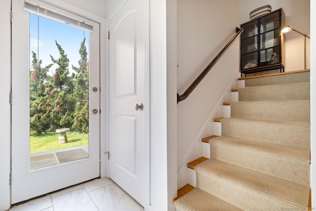 4 Old Fenwick Rd, Old Saybrook, CT 06475 - stairway featuring plenty of natural light and marble look tile flooring