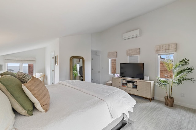 bedroom featuring an AC wall unit, light carpet, vaulted ceiling, and multiple windows