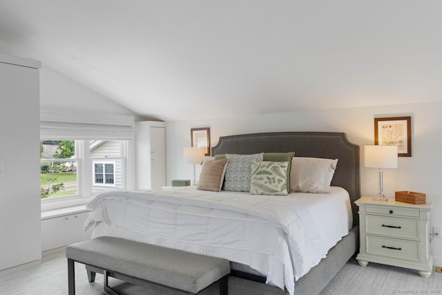 bedroom featuring vaulted ceiling