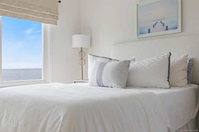 bedroom with a water view