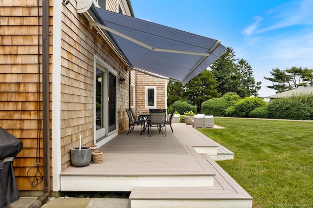 4 Old Fenwick Rd, Old Saybrook, CT 06475 - wooden terrace with outdoor dining area, a lawn, and an outdoor hangout area