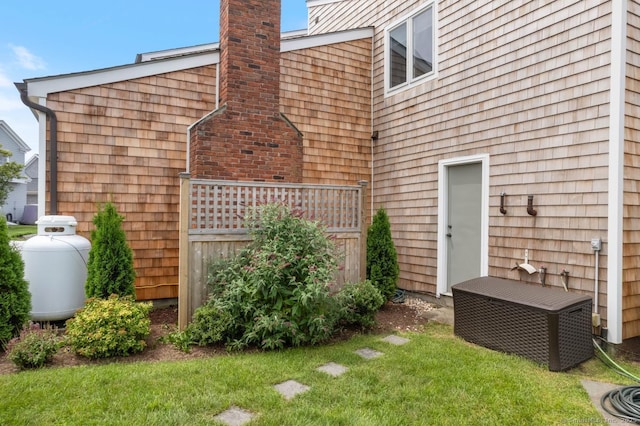 4 Old Fenwick Rd, Old Saybrook, CT 06475 - view of side of home with a chimney