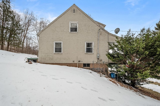 view of snow covered property