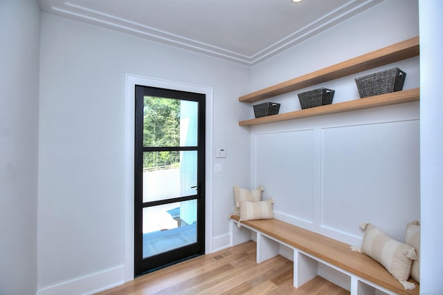 mudroom with wood finished floors