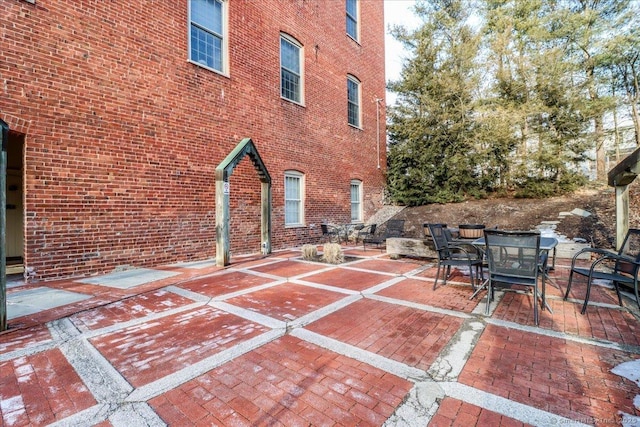 view of patio featuring outdoor dining area