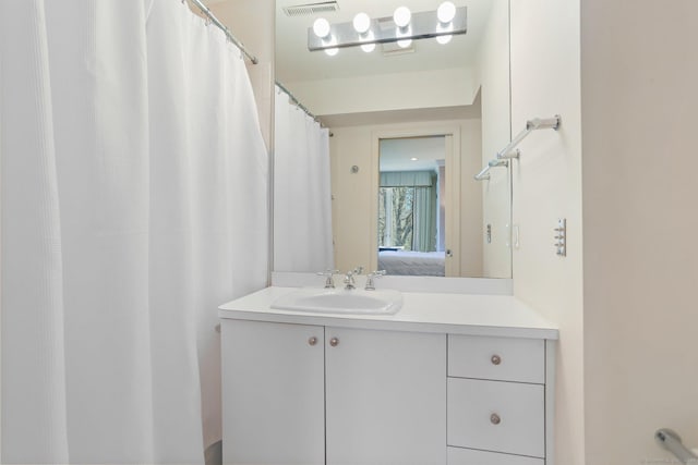 ensuite bathroom with vanity and ensuite bathroom