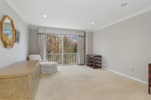 living area featuring recessed lighting, wallpapered walls, ornamental molding, and carpet