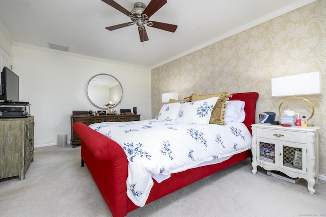 bedroom featuring light carpet, wallpapered walls, baseboards, visible vents, and crown molding