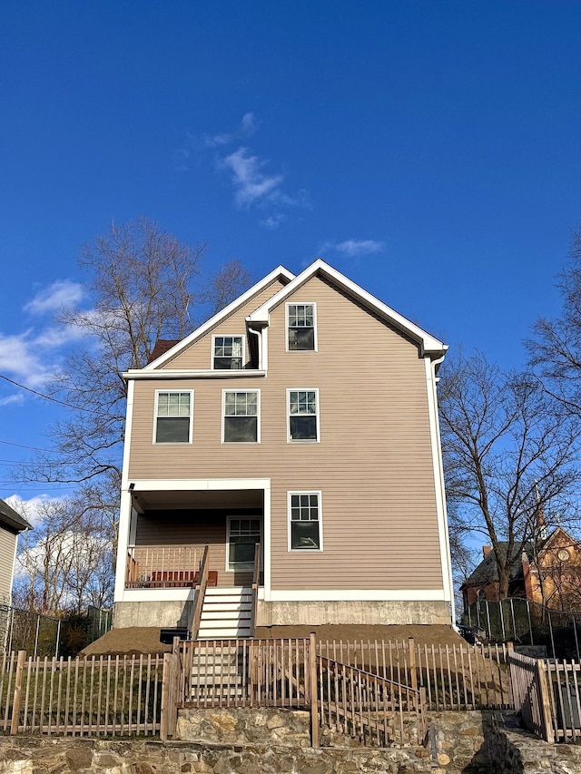 18 Soundview Ave, Norwalk, CT 06854 - back of property featuring stairway and a fenced front yard