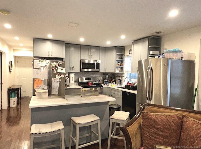 18 Soundview Ave, Norwalk, CT 06854 - kitchen featuring open shelves, gray cabinetry, and stainless steel appliances