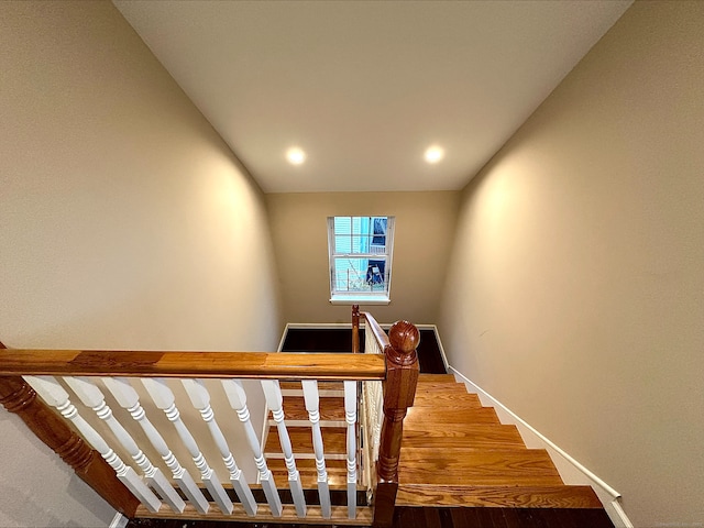 18 Soundview Ave, Norwalk, CT 06854 - stairs featuring recessed lighting, baseboards, and wood finished floors