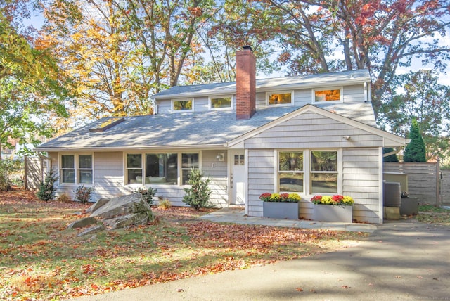 view of front of home with a chimney