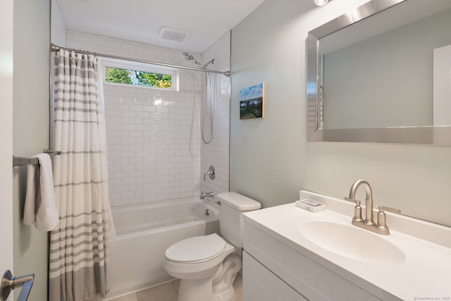 full bathroom featuring toilet, shower / tub combo, visible vents, vanity, and tile patterned floors