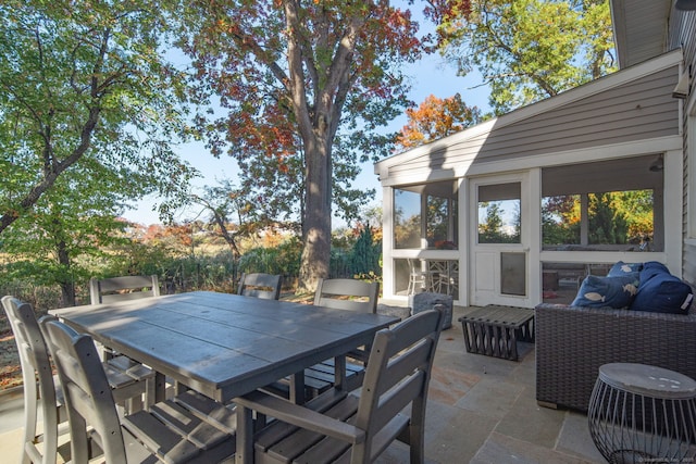 view of patio featuring outdoor dining area