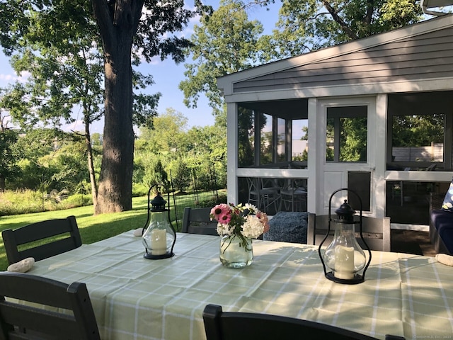 exterior space featuring outdoor dining space