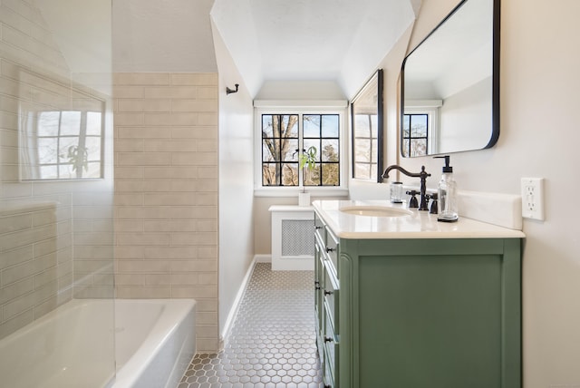 full bathroom featuring baseboards, vanity, and tile patterned floors