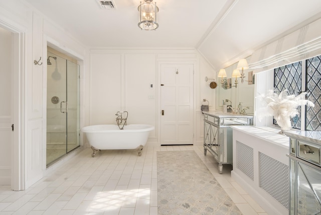 bathroom with lofted ceiling, a decorative wall, visible vents, a soaking tub, and a shower stall