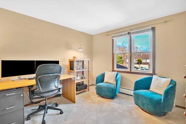 office area with a baseboard radiator, light carpet, and baseboards