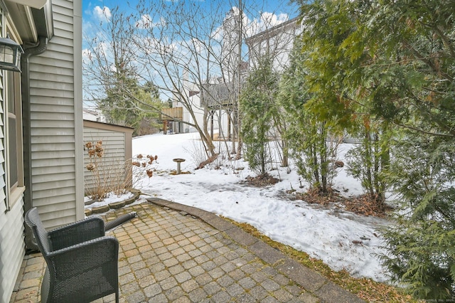 view of snow covered patio